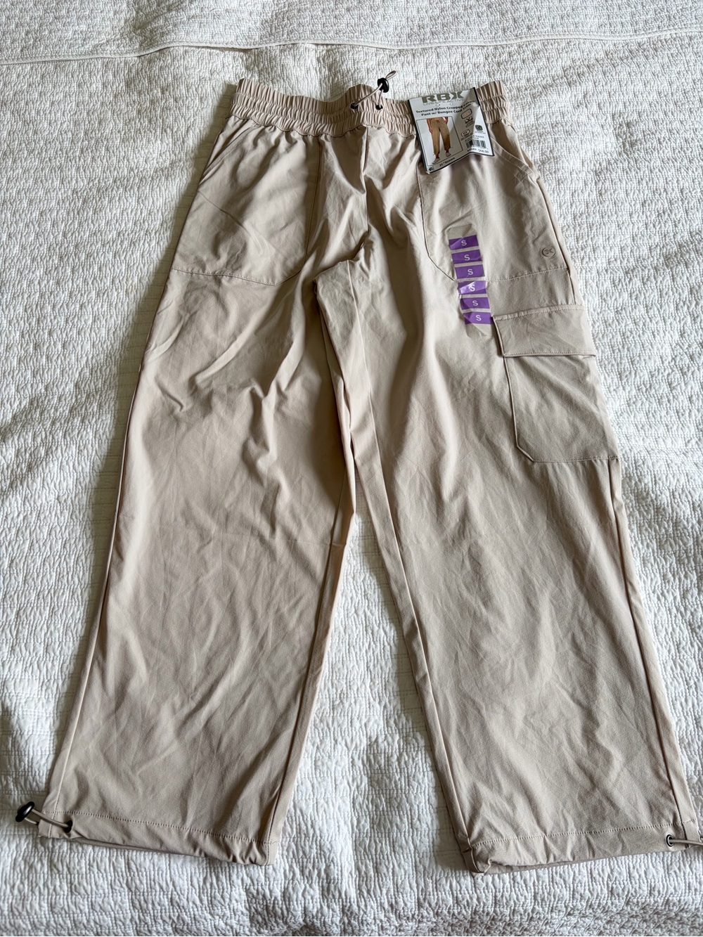 Reebok textured nylon cropped cargo pant with bungee cord trim size small